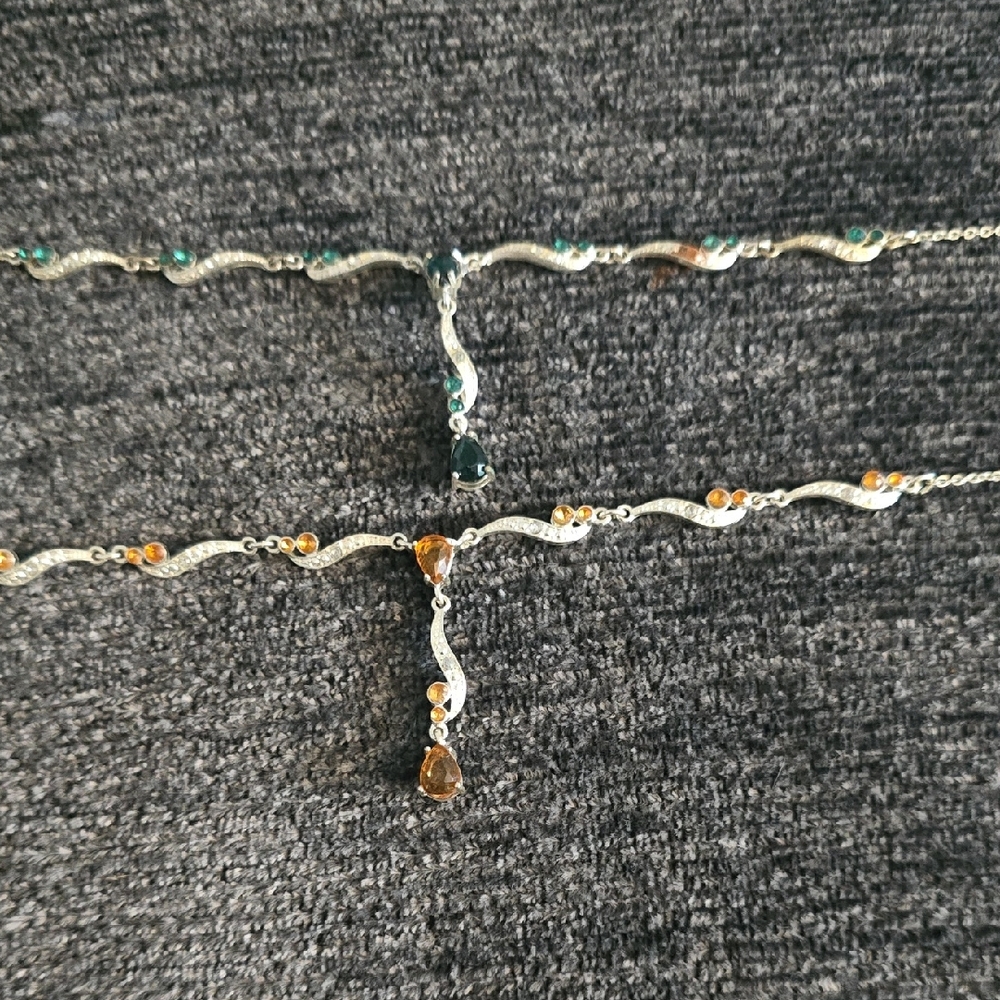Elegant Silver Necklace with Green and Brown Accents